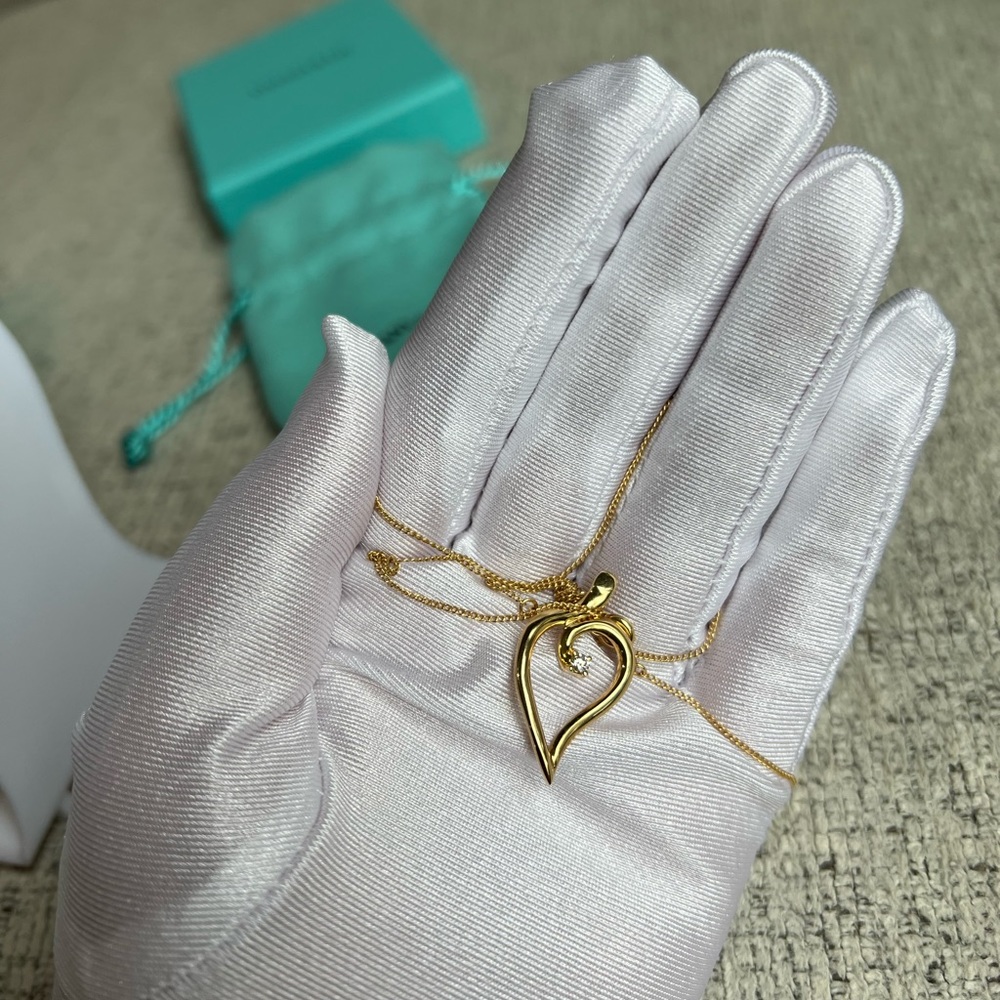 Tifanny & co. 18k Gold necklace with diamond